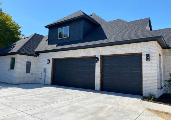 black-garage-doors-with-cedar-trim-2048x1536