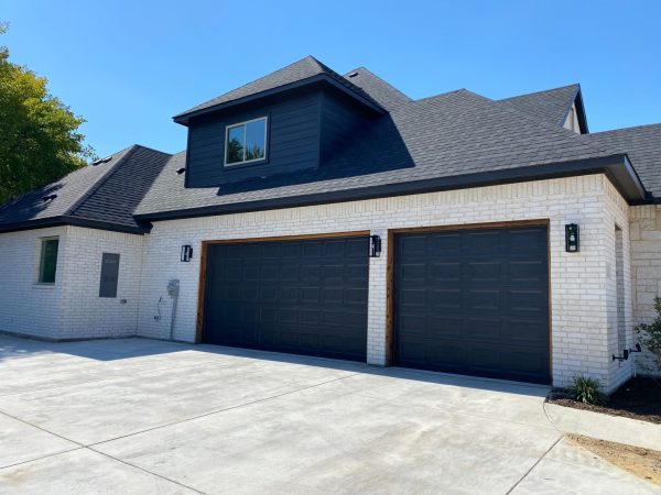 black-garage-doors-with-cedar-trim-2048x1536